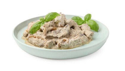 Tasty beef Stroganoff with basil isolated on white