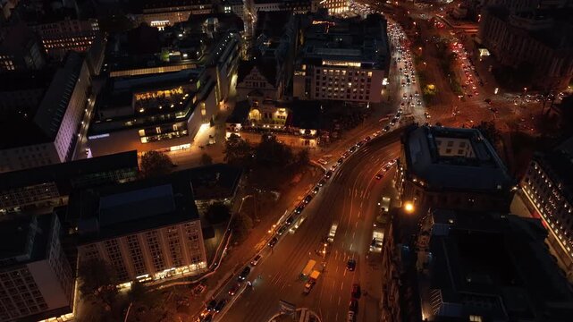 night time illuminated munich city center tram traffic street square aerial panorama 4k germany