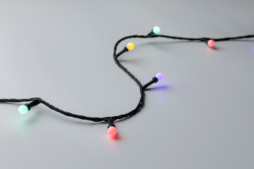 Bright Christmas lights isolated on white. Happy New Year