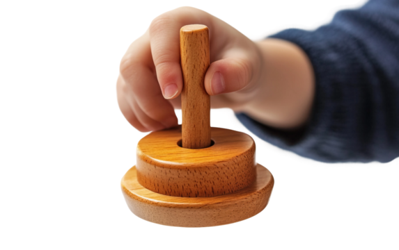Detailed shot of traditional Hanukkah game with spinning dreidel in children hands isolated on transparent background PNG