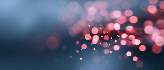 Abstract background with soft pink and red bokeh lights on a smooth blue gradient surface, creating a dreamy and festive atmosphere with blurred circular highlights