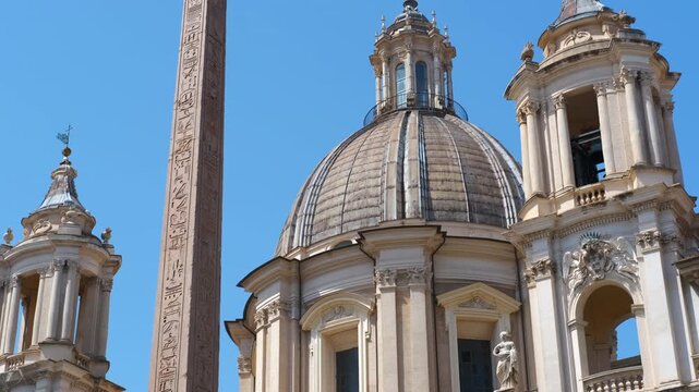 Sant'agnese in agone and obelisk at piazza navona in rome. Magnificent architectural details of the baroque church of sant'agnese in agone and the ancient egyptian obelisk