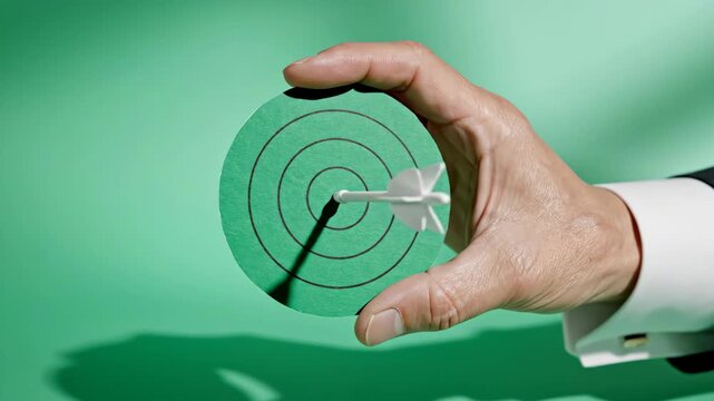 Precision target with arrow hitting bullseye demonstrates business goal achievement