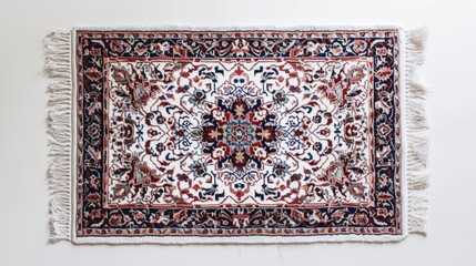 Obraz premium An ornate Persian style rug with a traditional floral pattern. Top view flat lay of an oriental carpet isolated on a white background