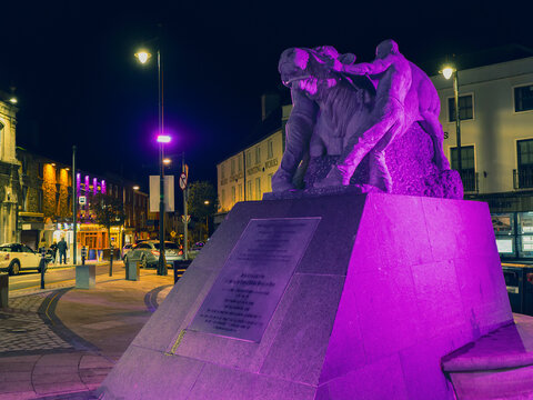 Navan, Ireland - 25.10.2025: The Bull of Navan stone sculpture illuminated at night.