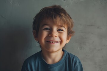 Portrait of a cheerful young boy showing his bright white smile with missing teeth