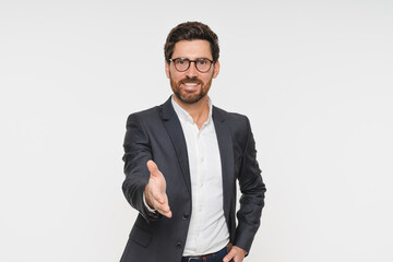Portrait, smile and business man with handshake in studio for agreement, interview or welcome on white background. Professional, corporate Caucasian person for greeting, thank you or job opportunity