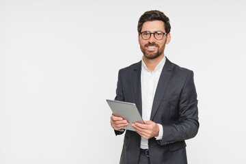 Portrait, smile and business man with tablet in studio isolated on white background. Ceo face,...