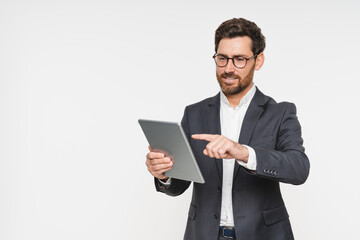 Business man with tablet, technology or corporate communication isolated on studio background. Internet, connectivity or networking professional, male worker or check email for career on mockup space