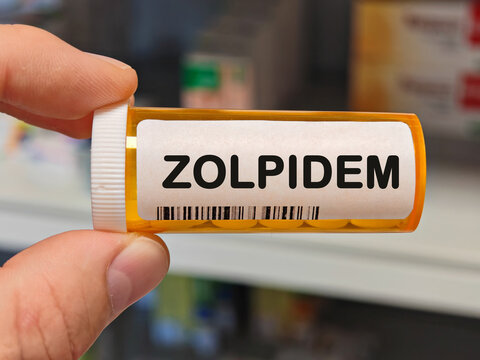 Box of ZOLPIDEM tablets on a hospital pharmacy table used to treat insomnia a non benzodiazepine hypnotic.	