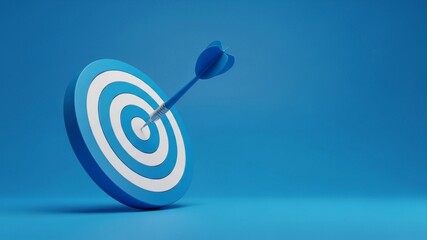 Dart hitting bullseye on target board in blue monochromatic setting.