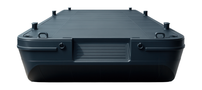 Flat-bottom barge featuring recessed ramps and secure tie-down points.