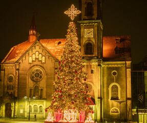 christmas tree and church in Tarnowskie Góry Poland