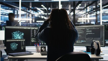 Angry server farm engineer frustrated by node tree systems unable to categorize unstructured data. Mad data center worker punching desk, annoyed by bugged visual programming software, camera A