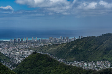 Pālolo Valley with the city skyline of Honolulu. Mauʻumae Ridge Trail (Puʻu Lanipō), Oahu, Hawaii. Koʻolau Range, shield volcano. On the right is Waʻahila Ridge