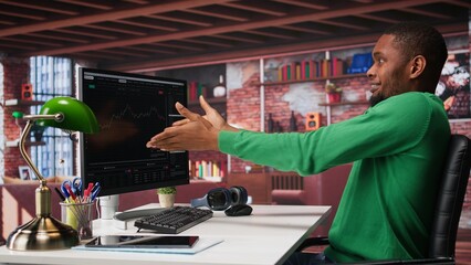 African american investor feels frustrated and sad after losing his stocks, going into bankruptcy and losing all his financial assets. Distraught man experiencing a monetary setback. Camera B.