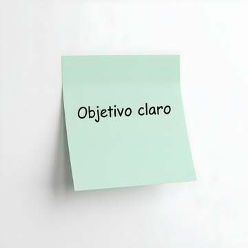 Nota adhesiva color pastel con la frase &lsquo;Objetivo claro&rsquo;, estilo simple, sin elementos decorativos, fondo limpio