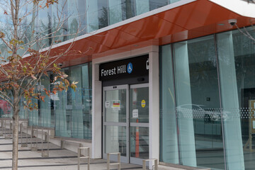 Fototapeta premium exterior entrance facade and sign at Forest Hill LRT Station, Eglinton Crosstown, located at 842 Eglinton Av W, Toronto