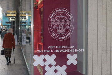 Fototapeta premium Mastermind Toys pop-up shop at Holt Renfrew sign and shop windows (looking west on Bloor W) located at Holt Renfrew Centre located at Bloor St W, Toronto