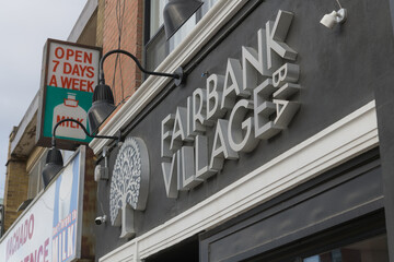 Fototapeta premium exterior sign of Fairbank Village BIA located at 1988 Eglinton Av W, Toronto