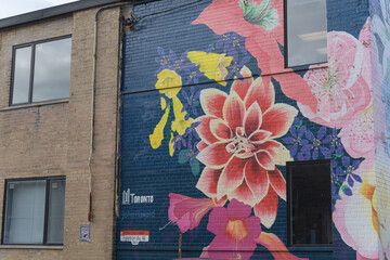 Fototapeta premium flower mural on the exterior of John Howard Society of Toronto located at 1669 Eglinton Av W, Toronto