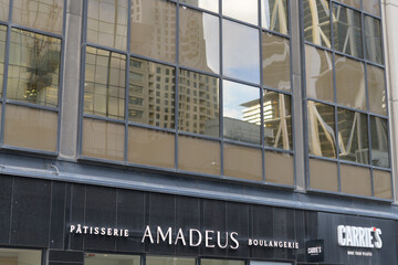 Fototapeta premium exterior building facade and sign of Amadeus Patisserie, a bakery, located at 1235 Bay St, Toronto