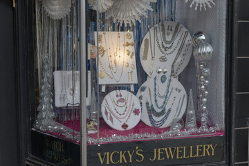 Fototapeta premium display window with merchandise at Vicky's Jewellery Ltd, a jewelry store, located at 404 Eglinton Av W, Toronto