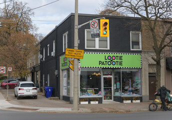 Fototapeta premium exterior building facade and sign of Lootie Patootie, a party store, located at 1070 Eglinton Av W (at Old Park Rd), Toronto