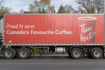 Fototapeta premium Tim Hortons delivery truck on Eglinton Av W, Toronto