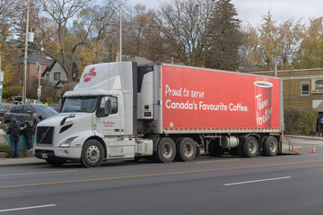 Fototapeta premium Tim Hortons delivery truck on Eglinton Av W, Toronto