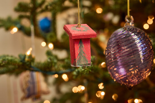 Festive christmas tree decorations with sparkling lights and colorful ornaments for a joyful holiday atmosphere