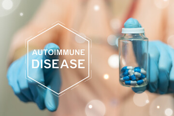 Autoimmune Diseases Research Health Care Innovation concept. Nurse using virtual touch screen presses the inscription AUTOIMMUNE DISEASE.