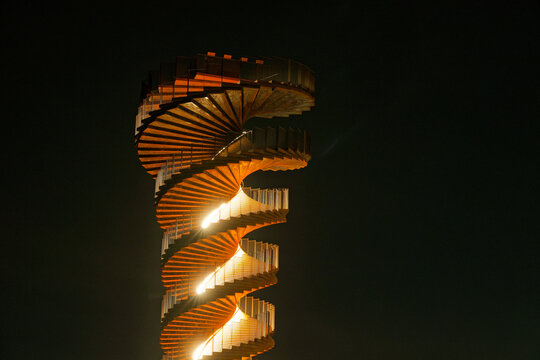 Marsk Tower lit at night with glowing spiral architecture in the Danish marshland