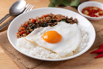 Thai food, Stir fried holy basil with minced pork with cooked rice and fried egg on top