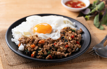 Thai food, Stir fried holy basil with minced pork with cooked rice and fried egg on top