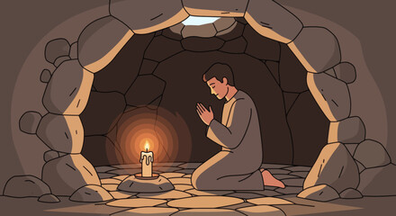 Man praying in a cave by candlelight seeking spiritual solace and reflection.