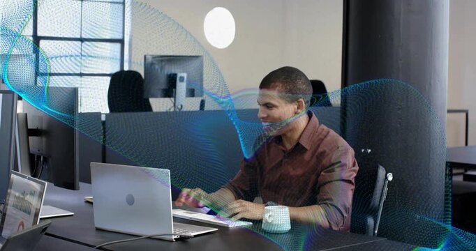 Man reading laptop result in tech office and celebrating, wave overlay guiding colleague to screen - Powered by Adobe