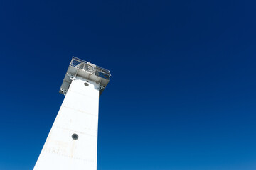 The white and red trimmed Sodus Point Lighthouse at Sodus Bay on Lake Ontario in New York State