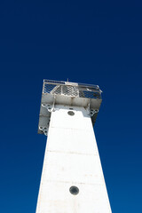 The white and red trimmed Sodus Point Lighthouse at Sodus Bay on Lake Ontario in New York State