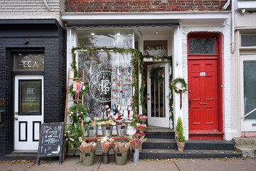 Fototapeta premium Old buildings with stores and restaurants in the trendy west Queen Street area of Toronto