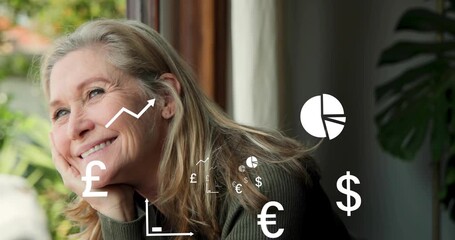 Mature woman at window resting gazing as finance £€$ charts floating near shoulder about savings - Powered by Adobe