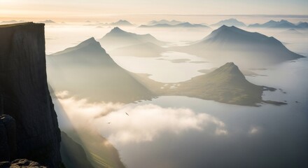 Overlooking a misty fjord mountain valley with sunbeams. Scenic landscape of the coastline with misty mountain peaks and a serene body of water.