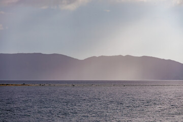雲の下に激しく降るスコールが見える。
沖縄県那覇市那覇泊港
沖縄の海の玄関口、那覇泊港。
慶良間諸島の座間味島等へゆく高速ジェットフェリー。
クイーンざまみ3号に乗船した。
2025
