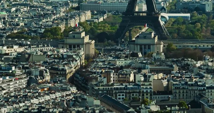 Aerial panning view of the historic center of Paris with the Eiffel Tower at summer day. Panorama of Paris from above. Aerial View on Eiffel Tower and Champ de Mars