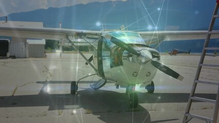 Camera starting close approach, airplane staying parked, network overlay pulsing, revealing door - Powered by Adobe