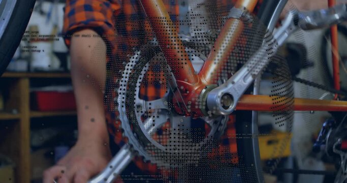 Woman mechanic turning wrench, removing crank arm, exposing chainring teeth during bike maintenance