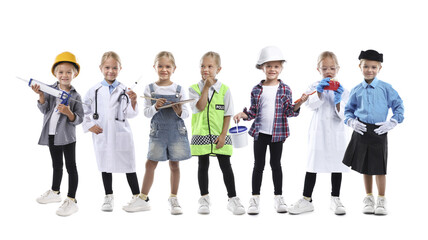 Obraz premium Little kid in different clothes on white background, collage. Choice of profession. Same girl representing various occupations