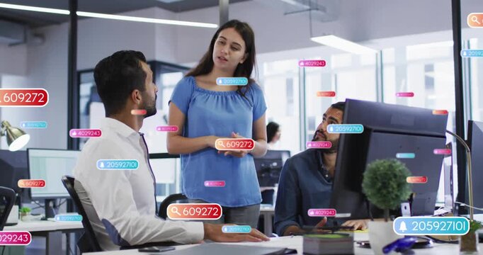 Woman stepping between team and explaining monitor analytics, animated UI badges growing over desk