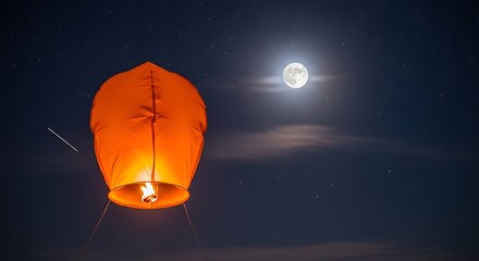 A solitary orange sky lantern ascends into the dark night sky illuminated by a bright full moon
