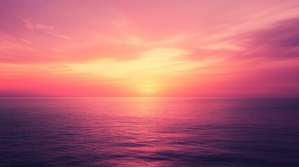 Fototapeta premium Soft sunset gradient transitioning from warm orange to deep pink, on blurred background 